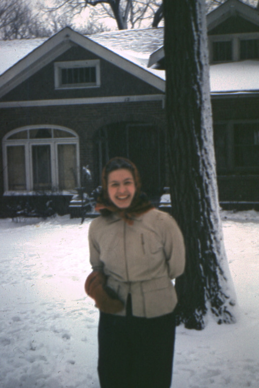 Jeane in front of Gross Family home at 12 Foster Drive - Des Moines, Iowa
